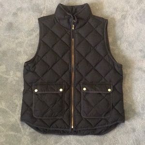 J. Crew black puffer vest with gold hardware